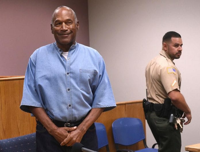 OJ Simpson granted parole in armed robbery case, to be 